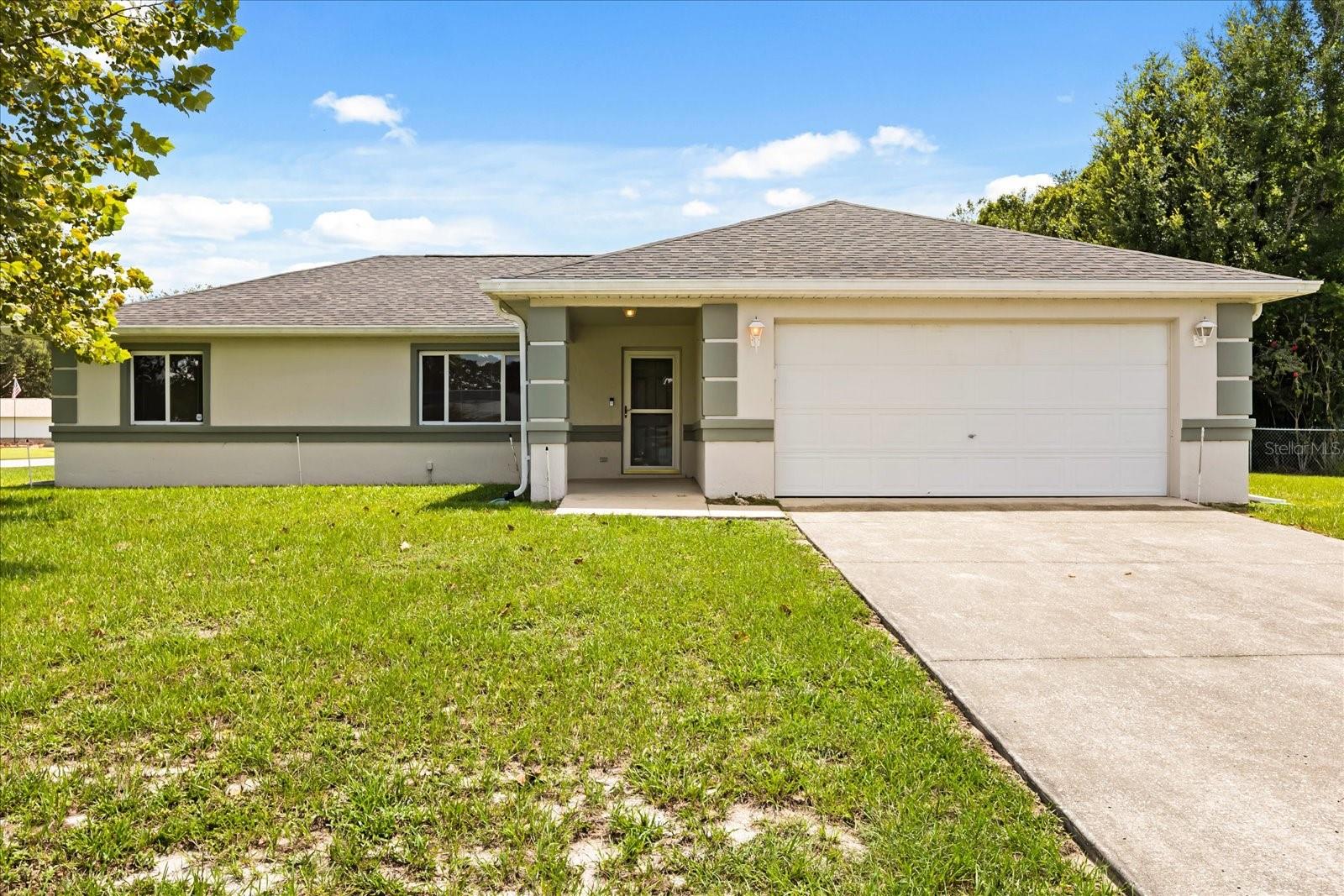 Welcome to Cherrywood Estates, a vibrant 55+ community where comfort and convenience meet! This charming 3-bedroom, 2-bath home features a spacious living room overlooking the backyard, perfect for relaxing or entertaining. The kitchen is a true highlight with stainless steel appliances, a stylish tile backsplash, granite countertops, and crisp white cabinetry. The master suite offers a private retreat with its own bath and an enclosed step-in shower. Enjoy Florida sunshine from your backyard oasis, while the 2-car garage provides plenty of storage. Ideally located near shopping, dining, and medical facilities, this home offers both ease and lifestyle. Don’t miss the chance to own in one of Ocala’s most amenity-rich communities!