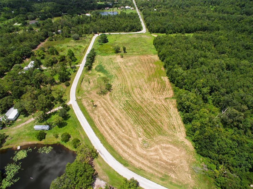 Send your offer! Approx. +/-8.07 acres in St. Cloud Manor Estates with NO HOA, NO CDD. Includes three parcels (PID# 112730495000010010, 112730495000010175, 112730495000010090) and approx. 717 ft of frontage. Bring your own builder and create a custom home or future investment. Plenty of space for outdoor activities, gardening, agricultural use, RVs, or boats (verify with county). Conveniently located near shopping, dining, professional offices, Lake Nona, Medical City, major highways, and the FL Turnpike. Buyers to verify zoning, land use, and dimensions. Property lines shown are approximate. Explore the possibilities—schedule your showing today.