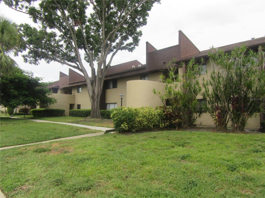 Photo of 875 S Village Drive N #101, St Petersburg, FL 33716 (MLS # TB8554173)
