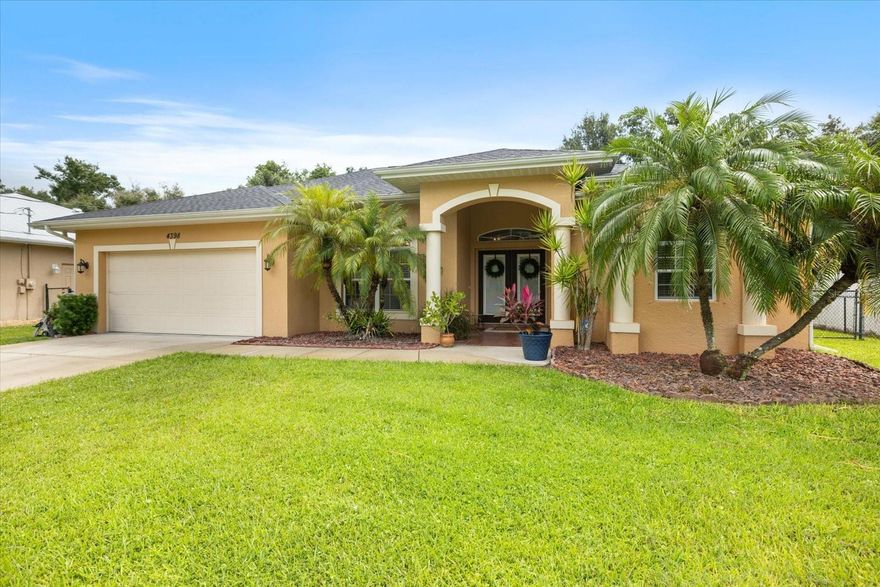 Attention!! 4.2% VA Assumable Mortgage on this refreshed and move-in ready 1,831 sq.ft. North Port diamond!! Discover the perfect blend of comfort and style in this meticulously maintained 3 bd/2 bth home, nestled in a serene North Port neighborhood.  The open floor plan welcomes you with abundant natural light, featuring a great room, dining room, and a thoughtfully planned kitchen that opens up into the family with custom built-ins and plenty of space for entertaining.  Once you step inside, you will notice elegant tile flooring in main living areas, soaring volume ceilings, and freshly painted interiors with tasteful color accents.  The home is also adorned with plant shelves, arched doorways, and new decorative light and fan fixtures. 3 sets of sliding glass doors allows you to enjoy leisurely afternoons on your screened in lanai, overlooking your private fenced backyard and mature trees.  Additional features include a dedicated laundry room, and the following upgrades performed in 2022: a new roof and HVAC system, storm shutters, hurricane rated garage door, irrigation system and water softener.  Conveniently located near I-75, Tamiami Trail, Warm Mineral Springs, and an ample amount of shopping, schools, hospitals and restaurants nearby.  Come and see why North Port is one of the fastest growing cities in all of America, and you will be pleasantly shocked at how much house you get for your money!