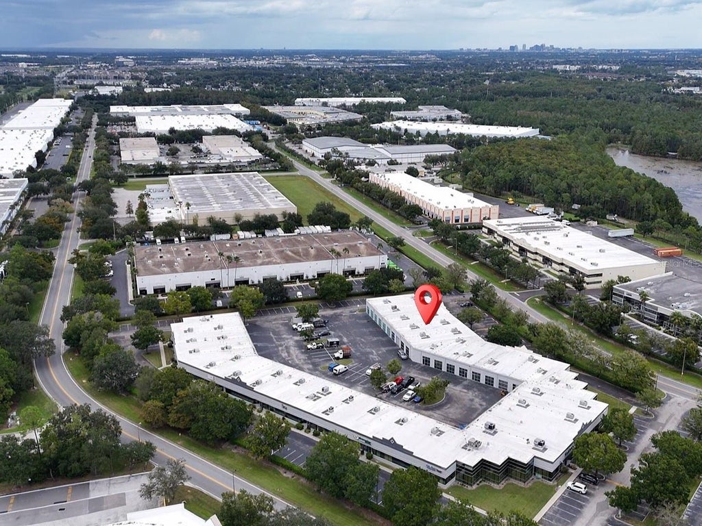 Photo of 7751 Kingspointe Parkway #104, Orlando, FL 32819 (MLS # O6448564)