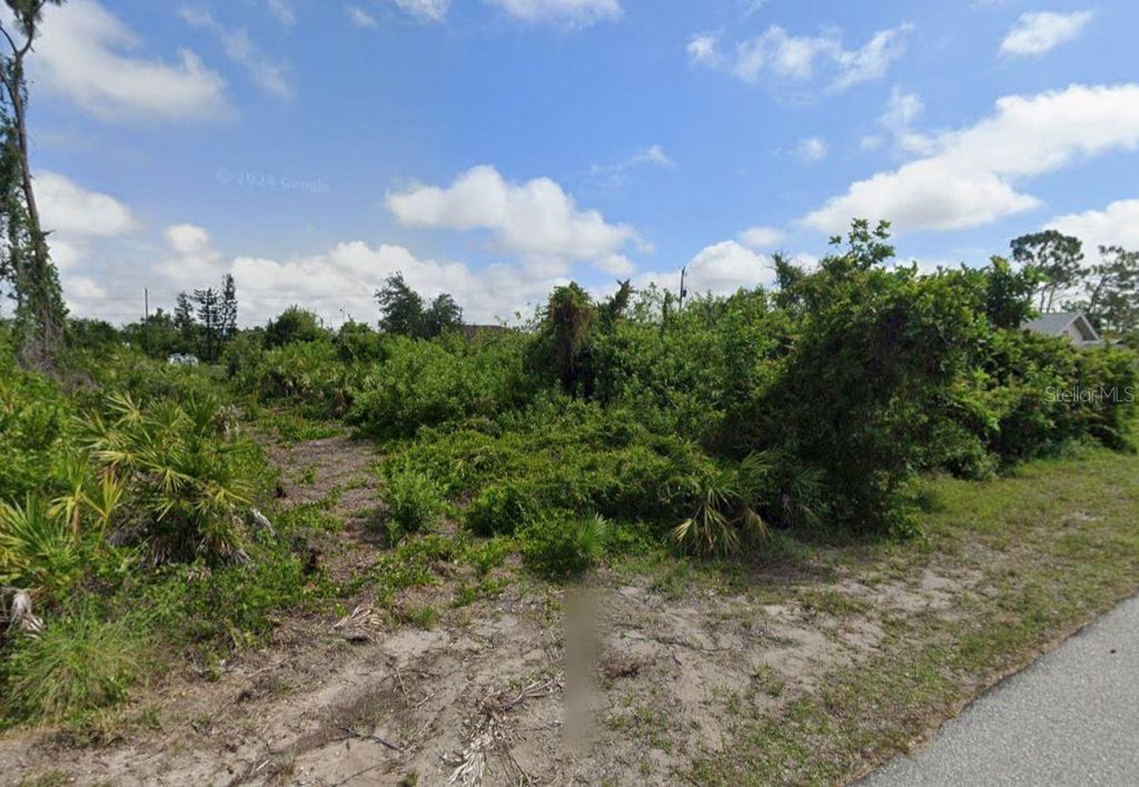 Photo of 12340 Hathaway Terrace, Port Charlotte, FL 33981 (MLS # C7515408)