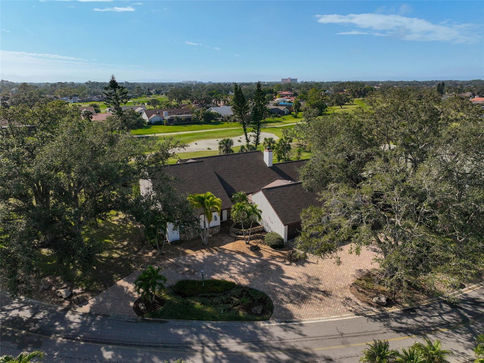 Annual turnkey furnished Want to live in a very spacious light filled, LARGE HOME, with a heated pool, on a golf course, in Country Club of Sarasota? This home is on a very large lot on Prestancia golf course so no close by neighbors. This home was designed with family time and entertaining in mind. The living room, dining room and den are open planned and filled with sunlight from sliding glass doors and clerestory windows and the ceiling is wooden and beamed and open to the heated pool with screened in lanai. The living room is sunken and the attached dining room overlooks the pool and golf course. The attached den has a rustic rock clad fireplace. The kitchen has solid wooden cabinetry, double oven, butlers pantry with bar frig and eat in area. The bedrooms are all roomy too with plenty of closet space. Sarasota Sports Club, tennis and swim memberships are optional. This home has access to top rated schools, is only 12 minute drive to Siesta Key, and close to shopping, dining, Legacy Trail, and downtown Sarasota with theater, opera and museums. CALL TODAY to make this dream come true.