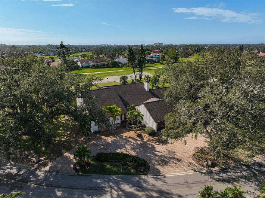 Annual turnkey furnished    Want to live in a very spacious light filled, LARGE HOME, with a heated pool, on a golf course, in Country Club of Sarasota? This home is on a very large lot on Prestancia golf course so no close by neighbors. This home was designed with family time and entertaining in mind. The living room, dining room and den are open planned and filled with sunlight from sliding glass doors and clerestory windows and the ceiling is wooden and beamed and open to the heated pool with screened in lanai. The living room is sunken and the attached dining room overlooks the pool and golf course. The attached den has a rustic rock clad fireplace. The kitchen has solid wooden cabinetry, double oven, butlers pantry with bar frig and eat in area. The bedrooms are all roomy too with plenty of closet space. Sarasota Sports Club, tennis and swim memberships are optional. This home has access to top rated schools, is only 12 minute drive to Siesta Key, and close to shopping, dining, Legacy Trail, and downtown Sarasota with theater, opera and museums. CALL TODAY to make this dream come true.