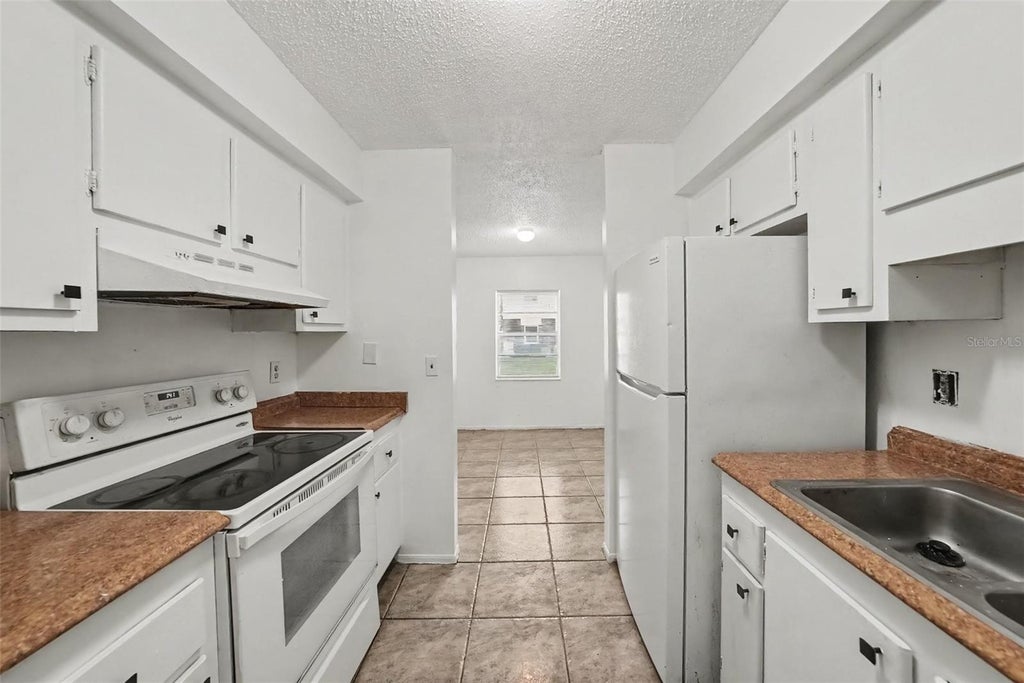 Photo of 305 E Wellington Court #64, Tampa, FL 33604 (MLS # TB8556806)