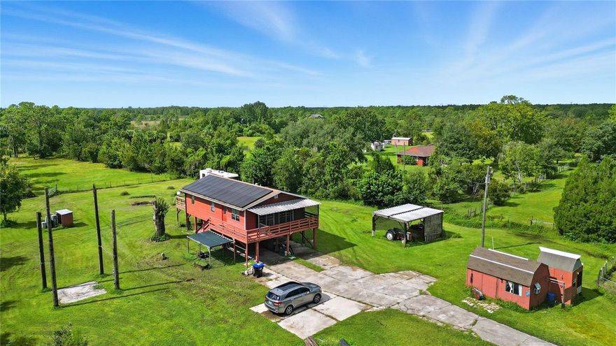 Looking for some serious space?! You found it here! Almost 5 acres of prime real estate. Professional photos and details coming soon. Owner enhancements/costs: Well filter system with chlorine and salt softener ($4,000). Wire and posts with gates to 3 pastures with water ($3,500). Spray expanding foam in attic ($5,500) Pole barn for tractor ($1,500) 30 by 70 - 6 ft deep pond ($3,500) Pressure treated back deck 15 by 30 ft ($8,000) Half bath added ($6,000) 2 stall bath house with heated shower ($10,000) Solar powered electric main gate opener ($3,000) Solar panels on roof ($30,000) 20 ft connex storage unit ($5,000) New well pump motor ($3,500) RV power and water hook up ($6,500) Hurricane windows and doors installed north and south facing ($6,000)