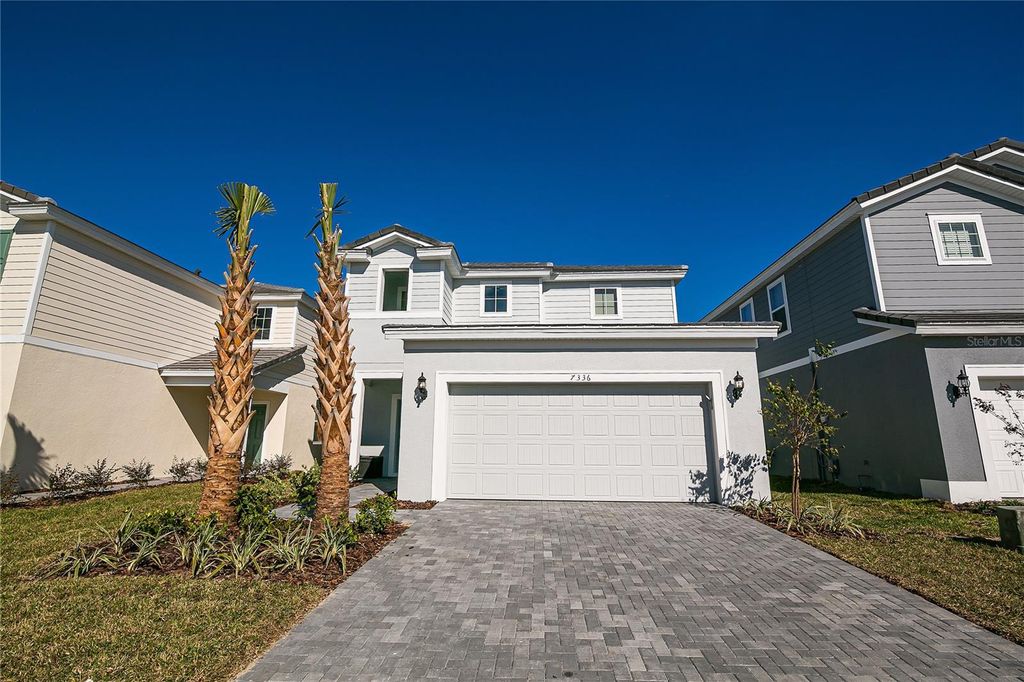 Photo of 7336 Oakmoss Loop, Davenport, FL 33837 (MLS # O6388379)
