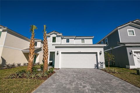 Photo of 7336 Oakmoss Loop, Davenport, FL 33837 (MLS # O6388379)