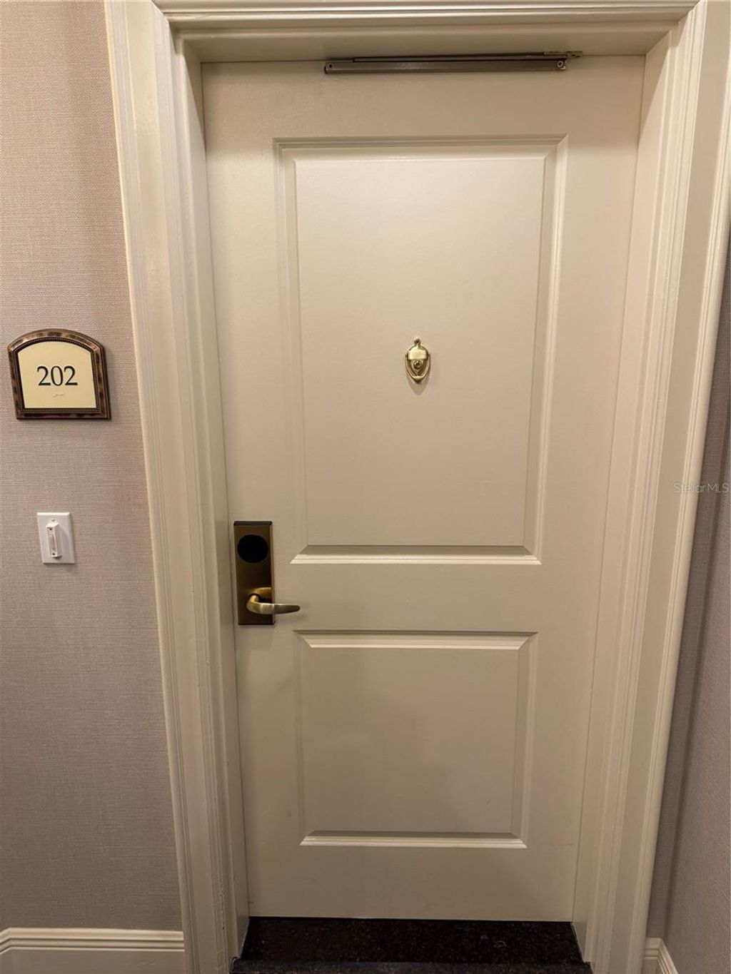 Photo of 8495 Miracle Drive #202, Champions Gate, FL 33896 (MLS # O6335243)