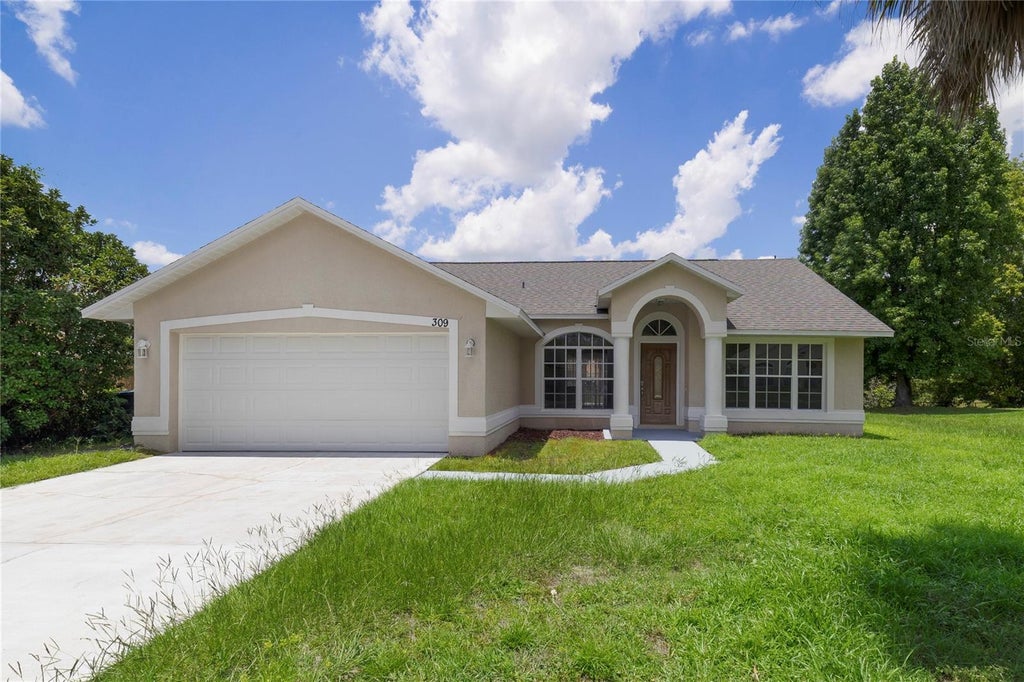 Photo of 309 Wild Forrest Drive, Davenport, FL 33837 (MLS # O6426181)