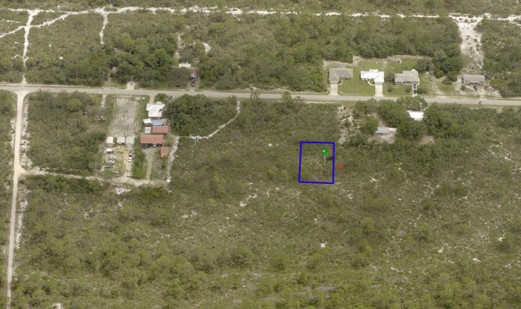 Photo of 1425 Columbine Street, Lake Placid, FL 33852 (MLS # O6451933)