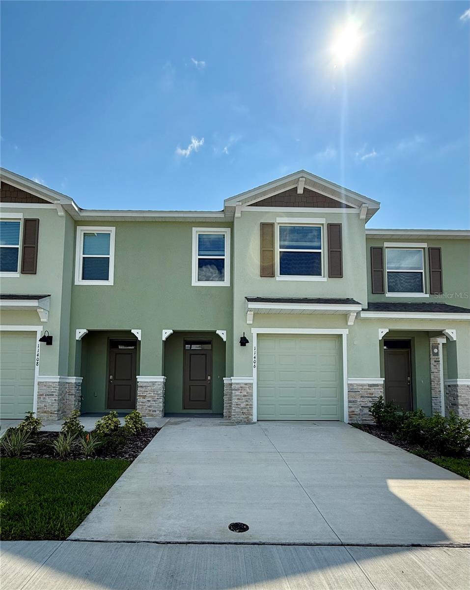 Welcome to this beautifully built townhouse located in the highly sought-after Angeline community in Land O Lakes. This modern home features 3 bedrooms, 2.5 baths, and a private 1-car garage, offering the perfect blend of style, comfort, and convenience. Step inside to discover a chefs dream kitchen complete with stainless steel appliances, granite countertops, an abundance of cabinetry, and a spacious center island ideal for cooking, dining, and entertaining. The main floor features gorgeous wood-look laminate flooring, while plush carpet adds comfort upstairs in the bedrooms. The luxurious primary suite includes a large walk-in closet and an elegant en-suite bathroom with dual sinks and a walk-in shower. Additional perks include a washer and dryer for your convenience and a covered back patio a perfect spot to relax or entertain outdoors. Residents of Angeline enjoy access to resort-style amenities including a community pool, playground, and more. Ideally located near top-rated schools, shopping, dining, and major highways, this home has everything you need for modern living. In addition to the advertised base rent, all residents are enrolled in the Resident Benefits Package (RBP) for $50.00/month which includes HVAC air filter delivery, credit building to help boost your credit score with timely rent payments, utility concierge service making utility connection a breeze during your move-in, and much more! More details upon application. Pets welcome, max 3. Trash, lawn and internet are included in rent. Vacant and Available Now!