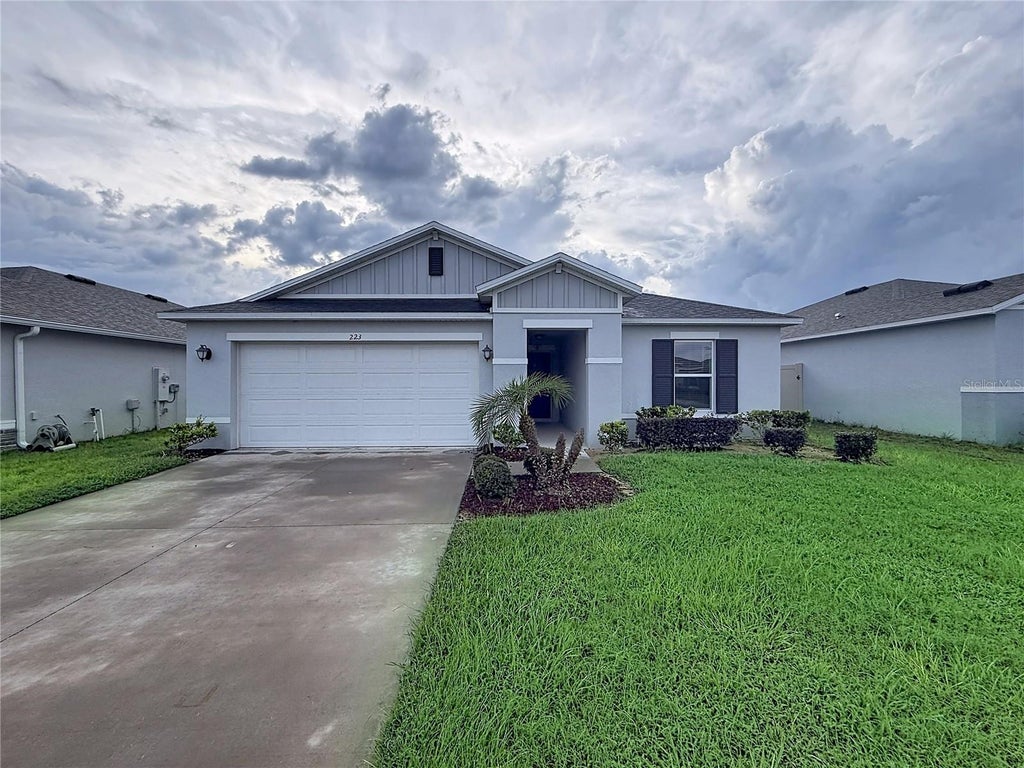 Photo of 223 Summerlin Loop, Haines City, FL 33844 (MLS # S5158345)