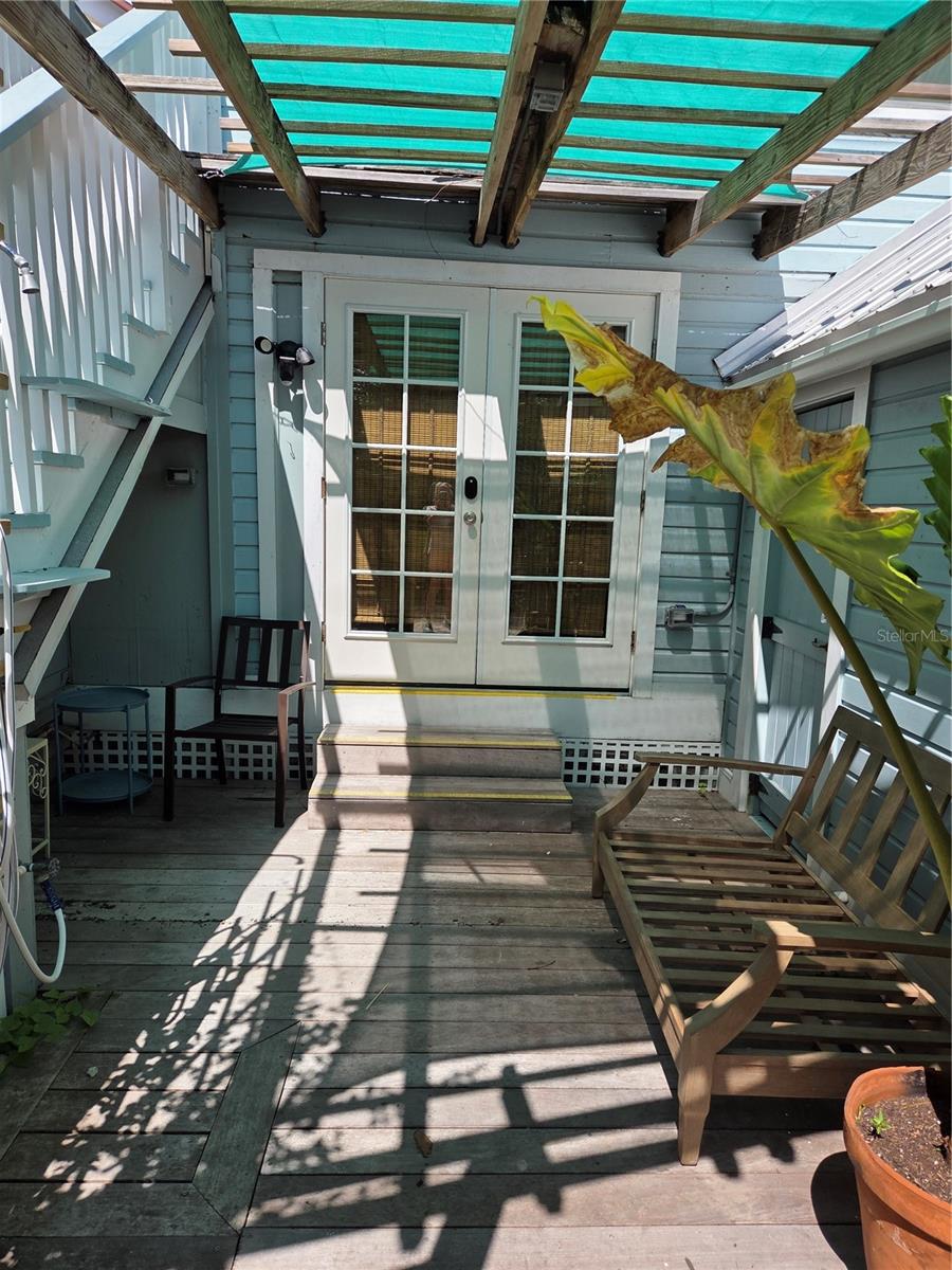 Photos coming soon! Charming first floor condo with a quaint cottage feel! Updated kitchen with new appliances and granite counter tops. Hot water tank is 2024 and AC is 2025. French entrance doors are hurricane impact. Enjoy al fresco in your enclosed patio! New pavers surrounding the condo and beautifully maintained flower garden will delight the senses. 2021 manufactured, rebuilt in 2024 golf cart included. In the heart of the Village of Boca Grande, this property is a quick stroll to the beach, restaurants and shopping. A truly perfect opportunity to have your little slice of paradise!