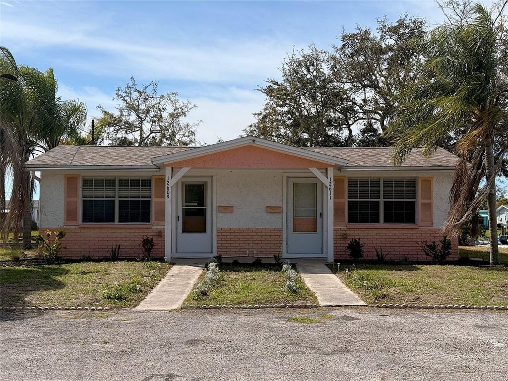 Photo of 12611 1st Isle, Hudson, FL 34667 (MLS # TB8489197)