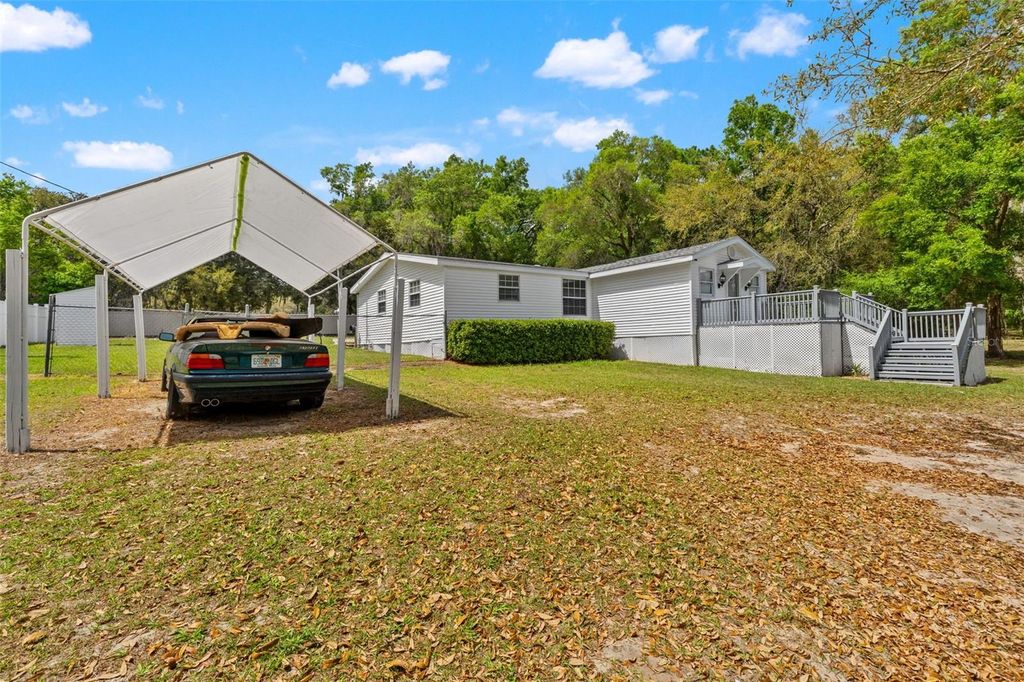 Photo of 7610 County Road 663, Bushnell, FL 33513 (MLS # W7884726)