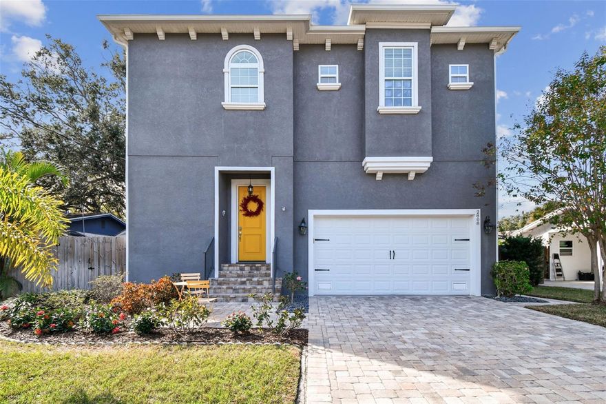 Discover South Tampa living in this beautifully designed, move-in-ready 2016 custom home, perfectly situated on a quiet, low-traffic semi-circle street ideal for walking, biking, and families. Built for easy ownership, this home features impact-rated windows, a brick-paved driveway, a sprinkler system, and a fully fenced, turfed backyard with a spacious side yard, perfect for pets, play, and year-round outdoor enjoyment. A screened and covered back patio, storage shed, and two-car garage with overhead storage add even more convenience.

Inside, the home feels warm and inviting with 10-ft ceilings and abundant natural light create an open, modern look. Crown molding and durable LVP flooring on the main level and primary suite enhance the home’s modern character. The inviting kitchen offers extensive cabinetry, granite countertops, stainless steel appliances, a large island for at least four, a subway tile backsplash, an oversized pantry, and a built-in wine fridge. All bedrooms are thoughtfully placed on the second floor, including a true guest/en-suite bedroom with its own full bath. The generous primary suite features dual walk-in closets with custom built-ins and provides a comfortable retreat.

Nestled in the highly desirable Ballast Point neighborhood, this home places you just a 4-minute stroll to A-rated Ballast Point Elementary and minutes to Bocelli Modern Italian, Kiwa Asian Kitchen, and Strachan Ice Cream. Only 11 minutes on foot brings you to the Tampa Yacht Club, Ballast Point Park, and the start of Bayshore Boulevard’s iconic waterfront path. You’re also just 10 minutes from Hyde Park Village, Downtown, and Water Street, and less than five minutes from MacDill AFB, making this home ideal for both convenience and long-term value. Tucked away from busy thru-streets, this semi-circle street offers a peaceful, low-traffic setting. This exceptional location blends luxury living, low-maintenance design, and unmatched accessibility, this home offers one of the best lifestyle opportunities in South Tampa.