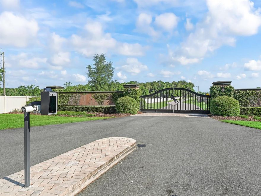 Welcome to your dream estate—where timeless elegance meets equestrian excellence on 5.25 impeccably maintained acres. Just minutes from downtown Ocala, under 20 minutes to the World Equestrian Center, and within 1.5 hours of Tampa and Orlando. Enter through a new solar-powered gated entrance with custom columns to find a private, fully fenced sanctuary with three pastures.
The 2023 custom block barn offers oversized stalls, A/C tack room, chandeliers, wash stall, premium mats, vapor tight fan(s) inside and outdoor, luxury rubber pavers—designed for comfort and function. A 2024 professional-grade arena (approx. 80x220 ft) features year-round footing, sprinkler system, and drainage for ideal riding.
The main residence welcomes you with stately pillars and handicap-accessible French doors. Inside: faux marble floors, Restoration Hardware chandeliers, 10–11 ft tray ceilings, and a split-bedroom layout with private primary suite. The chef’s kitchen shines with Bosch appliances, farmhouse sink, custom cabinetry, dry bar, and rollout counters—perfect for entertaining.
The living room opens to rolling pasture views and a screened lanai with a saltwater pool (dual waterfalls, overflow system) and full outdoor kitchen. Recent upgrades: interior/exterior paint, hardwired POE cameras, alarm system, 2022 whole-home generator with 500-gal propane tank, water softener/filtration, Tesla charging station, extra electrical panels, and new RV hookup.
With low utilities, high-end finishes, and equestrian amenities in a prime location, this estate offers luxury and functionality. MOVE-IN READY—furnishings optional, video walk-through available, inspection July 2025
