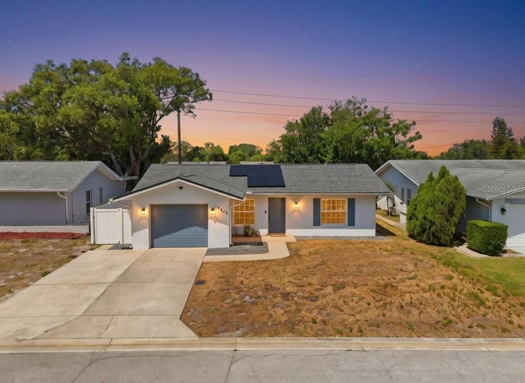 Photo of 10823 Casa Grande Avenue, Port Richey, FL 34668 (MLS # TB8499901)