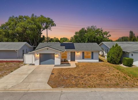 Photo of 10823 Casa Grande Avenue, Port Richey, FL 34668 (MLS # TB8499901)