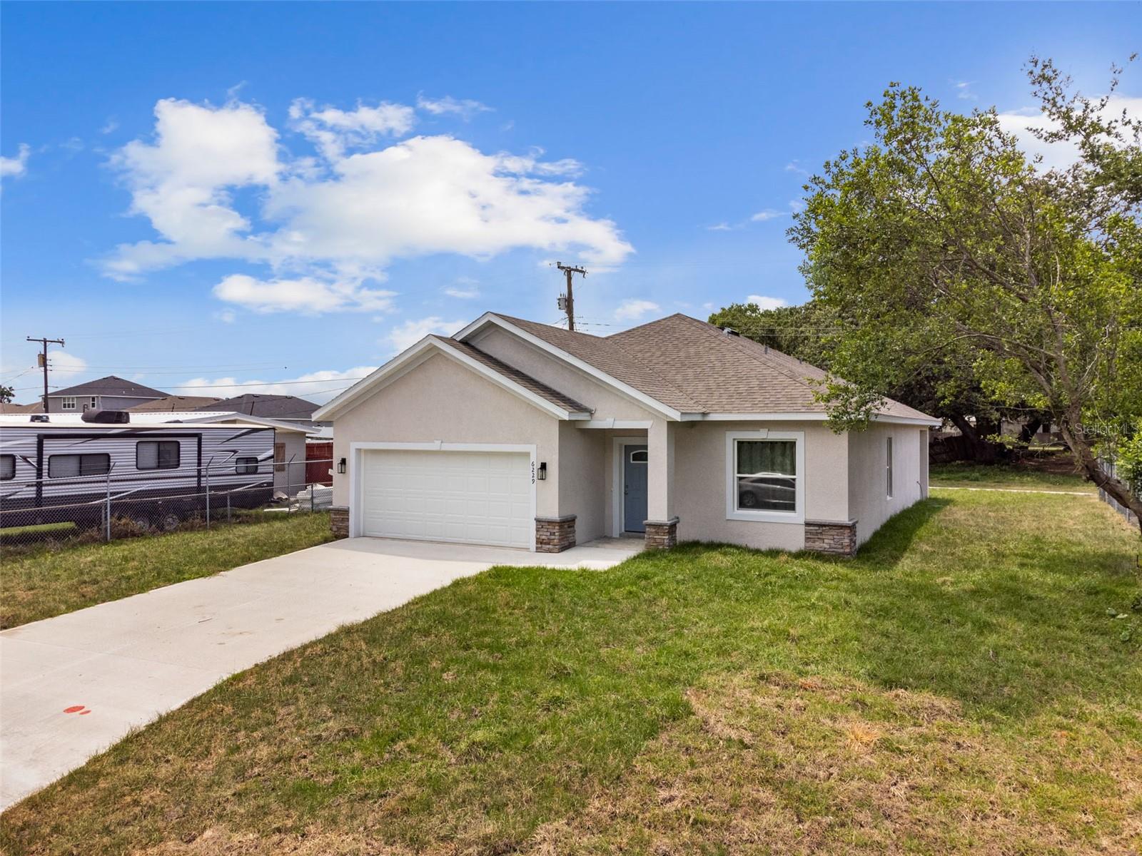 Under contract-accepting backup offers. Brand new construction, NO HOA, established neighborhood in Lakeland, close to major roads, stores and schools. White vinyl privacy fence installed. Laminate floor throughout, open layout with lots of kitchen cabinets, brand new stainless steel appliances and granite counter tops. Master bathroom has a double sink and big walk-in closet. Property is completed and ready for a new owner. Call for a private showing!