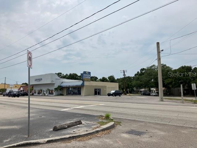 South Tampa - Corner location - Retail/office site with concrete building - 1 roll-up door - Signage on building - Lighted intersection - Building needs work - Owner occupied and will relocate post closing - Shown by appt and w/reasonable notice.