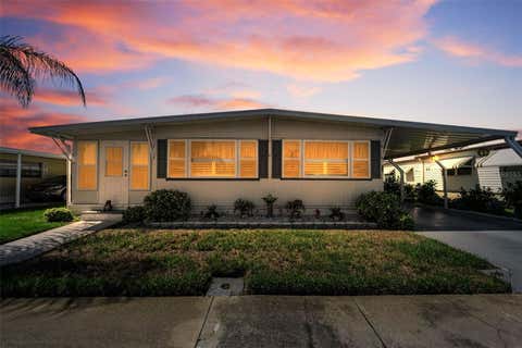 Photo of 143 Melody Lane, Tarpon Springs, FL 34689 (MLS # TB8537148)