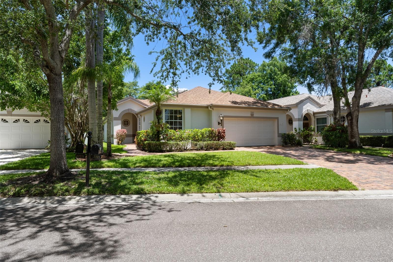 One or more photo(s) has been virtually staged. Welcome to 12209 Glencliff Circle, tucked away on a quiet cul-de-sac in the heart of Westchase’s highly sought-after Glencliff enclave. Perfectly positioned between serene preserve views in the front and direct golf course frontage in the back, this home offers one of the most idyllic settings in all of Westchase—at a price more than $100,000 below any other golf course home currently on the market.
Step inside and be greeted by soaring ceilings, oversized windows, and sliding glass doors that beautifully frame the lush fairways of the Westchase Golf Club. The thoughtfully designed layout places the primary suite at the rear of the home, complete with golf course views and private lanai access, creating a peaceful, retreat-like feel. The two guest bedrooms are positioned at the front, sharing a full bath—ideal for family, guests, or a private home office.
The kitchen has been fully updated, including modern cabinetry, solid surface countertops, and sleek appliances—ready for both daily living and entertaining.
A massive 532 sq ft covered and screened lanai offering panoramic views of the course. Whether you’re enjoying your morning coffee or hosting friends for sunset cocktails, this is where indoor comfort meets outdoor Florida living at its best.
Additional highlights:
Roof replaced in 2019
New paver driveway adds curb appeal
Glencliff HOA includes weekly lawn care & repainting every 6 years (last done in 2024)
Living in Glencliff means more than just a beautiful home—it means access to everything that makes Westchase one of Tampa’s most desirable communities. Walk just a few hundred yards to Glencliff Park, featuring playgrounds, fields, trails, and direct access to the Upper Tampa Bay Trail, a 16-mile paved path perfect for biking and family outings. Residents also enjoy two community pools, tennis courts, basketball, and miles of jogging paths.
And when it’s time to unwind or dine out, West Park Village and Westchase Town Center are just minutes away, offering a charming village atmosphere with sushi bars, gastropubs, cafés, salons, and boutique shopping.
Proximity to major highways, Tampa International Airport (20 minutes), Downtown Tampa (30 minutes), and the Gulf Beaches (45 minutes)—this home delivers prestige, convenience, recreation, and long-term value.
Don't miss the best-priced opportunity to live on the golf course in Westchase. Schedule your showing today.