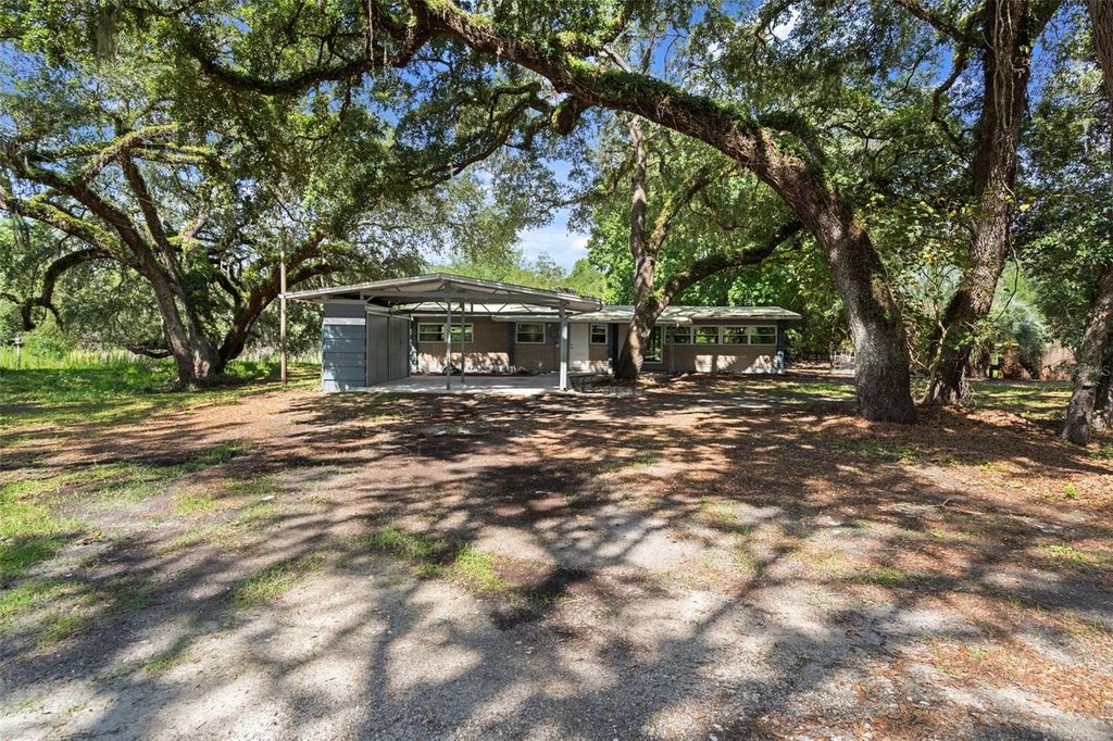 Photo of 34577 Orchid Parkway, Dade City, FL 33523 (MLS # W7876557)