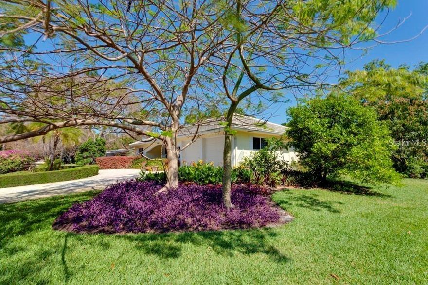 Nestled in the much desired Pinellas Point neighborhood of Saint Petersburg, this beautifully updated 3 bedroom, 2 1/2 bath home offers 2,206  sqft of refined living space with exceptional indoor- outdoor flow. COMPLETELY HIGH & DRY. Enjoy the extended, custom tiled front porch to the serene solar heated, complete lanai enclosed, saltwater pool, every detail reflects comfort, style, and quality of craftsmanship. Inside enjoy expansive natural light provided by beautiful windows and doors, gorgeous plantation shutters throughout. The large sunken living room is excellent for entertaining. Crown molding, and strand bamboo flooring gives grace to the home. The open floor plan provides for inviting central gathering with a vast family room featuring built-in cabinetry. Multible sliding glass doors add to the seamless French Chateau feeling as you walk uninterupted through the home and out to the completely enclosed salt water heated pool with adjacent updated bath room with modern elegant vanity. 
This home features a gourmet kitchen showcasing hardwood cabinetry, blue gray granite countertops, and a striking European-style granite center island. A deep double stainless sink and a ever popular desired, pass-through window the the pool area to enhance effortless entertainment. The large spacious primary suite includes a spacious California walk-in closet, direct private access to the pool, a newly designed primary bedroom features custom lighting, walk-in large shower, and seperate his and hers vanities. The second bath offers a newer installed jetted tub for added relaxation. Outdoor living is exquisit with custom installed full perimeter exterior decorative brick patio with added concrete border for that exceptional stability. In addition, the privacy of this home is sustained by newly installed vinyl fencing, mature landscaping enhances the custom built outside concrete fireplace perfect for evening gathering. An additional elivated tile patio exists on the side of this home adding to its entertainment value while providing seperate sitting areas to enjoy or avoid direct sunlight.. Additional features include, newly enclosed laundary room, spacious two car garage, stone slate roofing, Full security system with lighting, newer, 2024 A/C and hot water tank.
This elegant and thoughtfully updated property perfectly blends comfort, sophistication and outdoor Florida living to excellence. Designed to provide a feeling of privacy and European taste. Overhead, you'll enjoy the colors and beauty of the pergola providing for intimacy and shade. If you have ever been to southern Italy or France, you'll understand.
This home is an exceptional opportunity in one of Saint Petersburg's most sought-after communities. 20 minutes from two major airports, minutes from major hospitals, shopping, Rt. 275 and the Skyway bridge. The best of Florida beaches, fabulous dining, comedy clubs, beach bars and dancing, hotels, theators, museums and Maximo park with its walking trails and numerous boat launching ability. A ten minute Uber to downtown Saint Petersburg with its diverse stores, entertainment, yacht clubs and central avenue featuring three blocks of shops, dining and music. THE BEAUTY OF PINELLS POINT, is that you exist in a family centered tree lined haven minutes from Saint Petersburg center. Secluded charm with easy access to both the gorgeous Gulf of America with its fishing and boating, or all Tampa Bay has to offer with its charming night life.