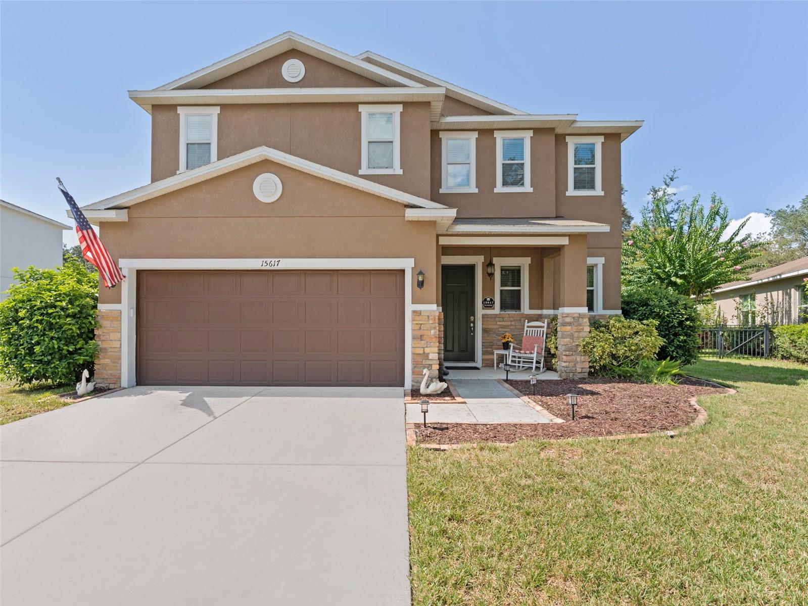 Tucked away on a lush lot in the scenic community of Lone Star Ranch, this two-story stunner offers one of the most private and picturesque settings in the neighborhood. With only ten homes in the subdivision fronting to a protected oak-lined esplanade, this rare homesite enjoys the peaceful luxury of having no neighbors directly across the street—just open green space framed by mature trees. The striking curb appeal is enhanced by a stacked stone façade, a front porch, and thoughtfully landscaped grounds.
Out back, the property opens to panoramic pond and conservation land and the expansive yard has been transformed into a family-friendly outdoor retreat offering a magical blend of shade and sunlight beneath towering oaks. It’s a true outdoor escape—complete with a zip line, hammock, swings, climbing rope, a firepit for starlit s’mores, and raised garden bed with a potting table ready for your green thumb and direct access to the pond, where local wildlife frequently visits.
Built in 2013 and maintained with care, this 4-bedroom, 2.5-bath home offers 2,455 square feet of open-concept living. Hardwood floors, soaring ceilings, and abundant natural light set a warm, inviting tone.
At the heart of the home, the chef’s kitchen is designed for everyday comfort and stylish entertaining, rich in warmth and detail, featuring crisp Shaker-style cabinetry topped with crown molding, under-cabinet lighting, glass tile backsplash, Granite countertops, stainless steel appliances, a sleek wine fridge, and a double-door refrigerator with middle drawer and bottom freezer drawer. The oversized center island hi-bar hosts a sink and dishwasher, seats four comfortably with included hydraulic bar stools, and is illuminated by modern pendant lighting.
The spacious living room flows seamlessly from the kitchen, creating an open, airy feel, perfect for everyday living and entertaining. A cased opening lends architectural charm and defines the formal dining room, adding both character and distinction. Upstairs, four generously sized bedrooms are peaceful retreats, including a serene primary suite where graceful oak branches filter the tranquil pond view. The ensuite bath features a garden soaking tub, separate shower, double vanity, and ample storage. Two full bathrooms serve the upper level, while a conveniently located powder room adds functionality to the main floor. Step outside to a covered and screened lanai—complete with a screen door that leads to the paver pad—ideal for enjoying Florida’s beautiful weather in comfort and privacy.
Additional features include a high-end Carrier AC system with air purification (installed just three years ago), a Culligan salt water system with quarterly service, a Rainbird irrigation system with multiple zones, and a second full refrigerator in the garage. The laundry room includes a built-in pet door leading to a fenced dog yard, and new carpet was installed on the stairs in June. Public water and sewer, NO CDD, low HOA adds to the practicality of this move-in ready home.
Ideally situated just two minutes from the Suncoast Parkway (SR 589) and Highway 52, with convenient access to shopping, schools, parks, and Tampa-area attractions, this home delivers a rare blend of charm, space, and convenience in one of Spring Hill’s most treasured hidden-gem communities. Don’t miss out, schedule your private tour today!