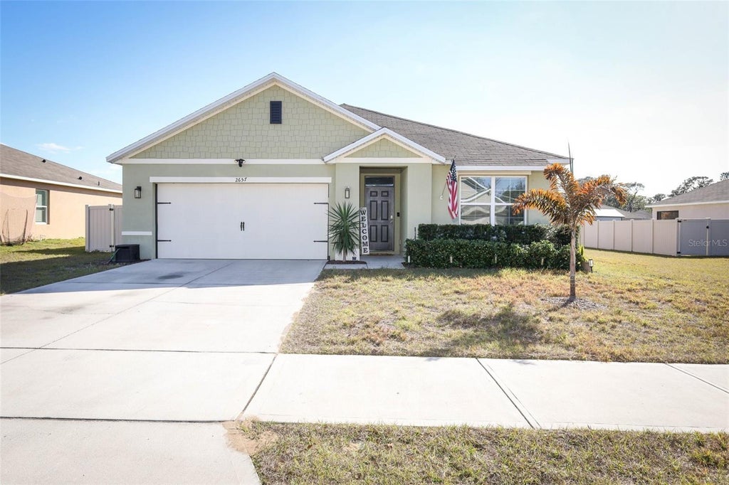 Photo of 2657 Grand Central Ave, Tavares, FL 32778 (MLS # O6440163)