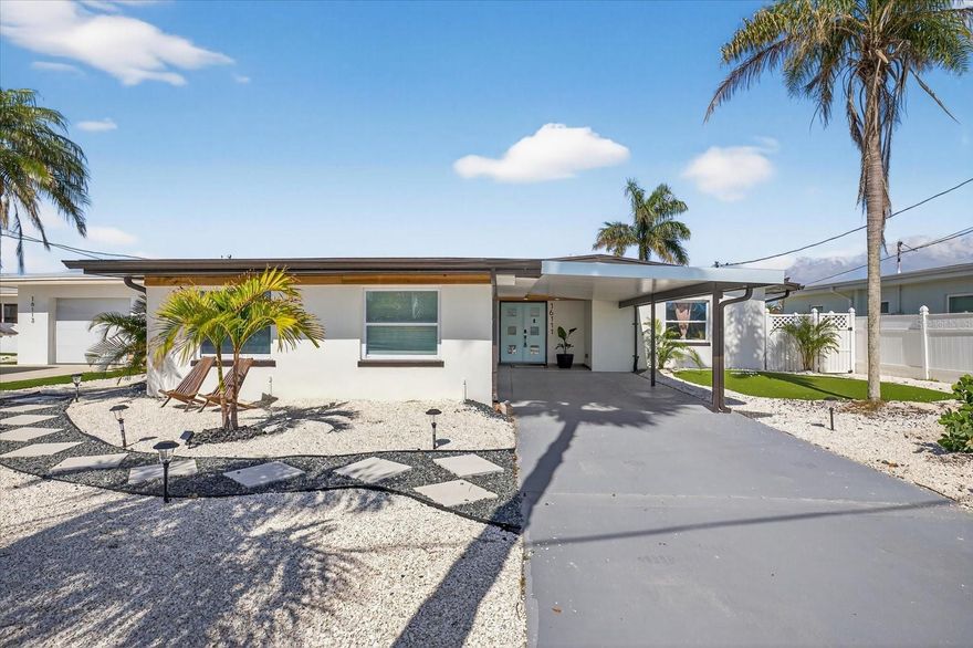 Welcome to a rare waterfront opportunity in the charming coastal community of Redington Beach. Situated directly on the Intracoastal Waterway, this beautifully renovated 3-bedroom, 2-bath coastal residence offers the perfect blend of modern design, boating lifestyle, and income potential.The home has been thoughtfully remodeled with an open-concept layout, designer finishes, and abundant natural light throughout. The kitchen features custom cabinetry, quartz countertops, open shelving, and premium appliances, seamlessly connecting the living and dining areas while capturing peaceful waterfront views. The spacious primary suite serves as a private retreat and features a spa-inspired bathroom with a freestanding soaking tub and elegant modern finishes. Step outside to experience the true highlight of the property — a private waterfront oasis featuring a custom pool, expansive entertaining patio, new dock and boat lift, and direct Intracoastal boating access. From your dock, enjoy quick boating access to the Gulf of Mexico and nearby destinations including John’s Pass Village and Boardwalk, known for waterfront restaurants, shops, and marinas.The property has also undergone extensive upgrades including Impact-rated windows, sliders and doors, Solar panel system owned free and clear, Updated plumbing, Updated electrical, Fully renovated interior, including new kitchen, bathrooms, flooring, paint and so much more! A bonus flex room currently used as a fitness space is cooled with a portable AC unit and offers excellent potential to be converted into a fourth bedroom with the installation of a mini-split system, or used as a home gym, studio, storage space, or golf cart garage. The front yard features low-maintenance zero-scape landscaping. Put like Tiger on your custom SYNLawn true put surface. Same as used by Tiger Woods for his practice facilities, creating a fun outdoor feature perfect for entertaining or practicing your short game. Located just minutes from the Gulf beaches, residents enjoy the unique benefits of Redington Beach including resident-only free beach parking, easy beach access, and community events throughout the year. With projected annual rental income of approximately $165,000, this potential Short-term rental is an excellent investment opportunity. Whether used as a primary residence, vacation retreat, or income-producing property, this waterfront home offers the very best of Florida coastal living.