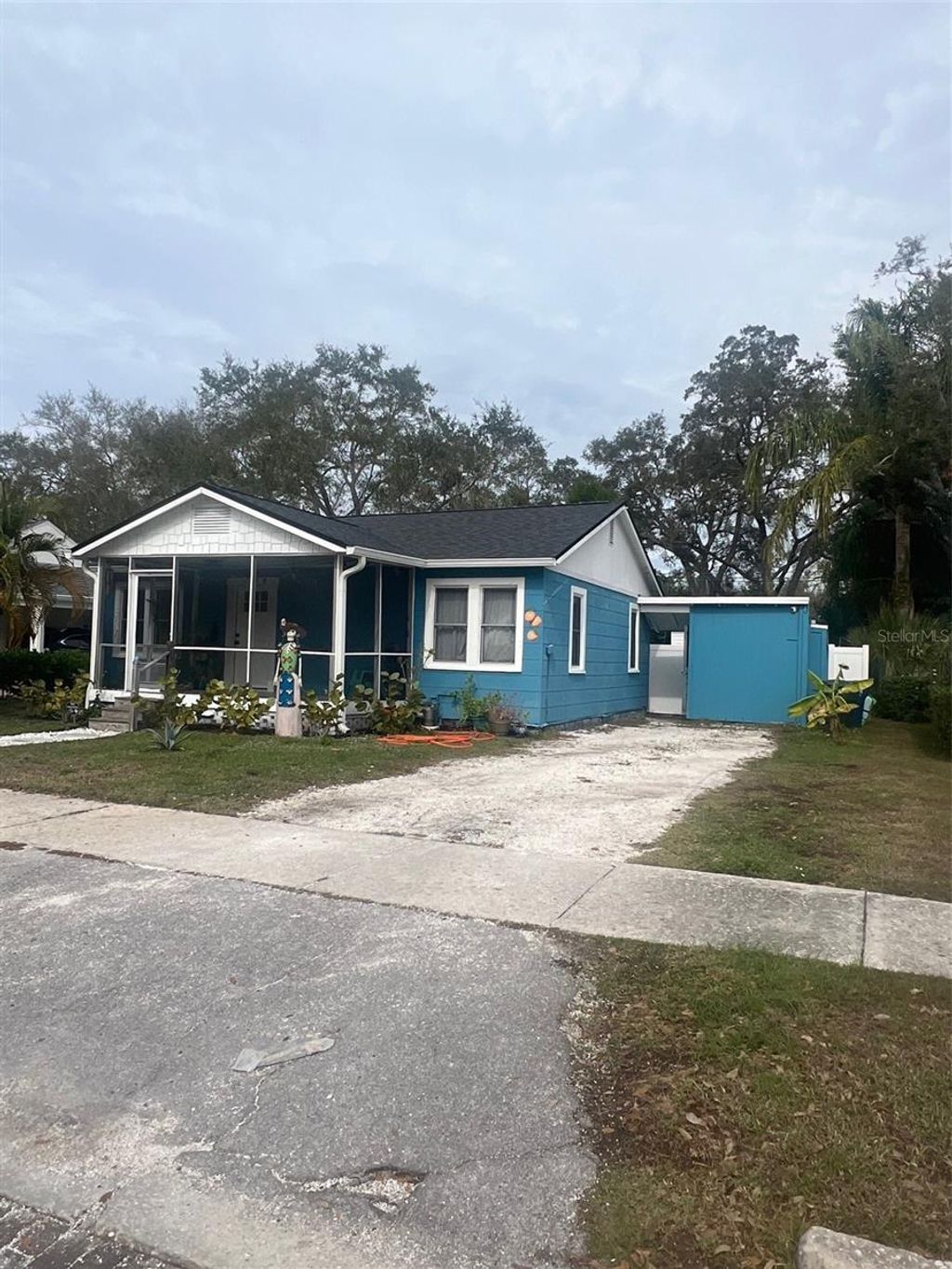 Photo of 520 Roanoke Street, Dunedin, FL 34698 (MLS # TB8464687)