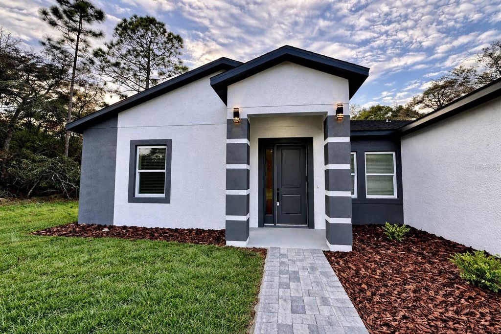 Photo of 7162 N Maltese Drive, Citrus Springs, FL 34433 (MLS # O6368345)