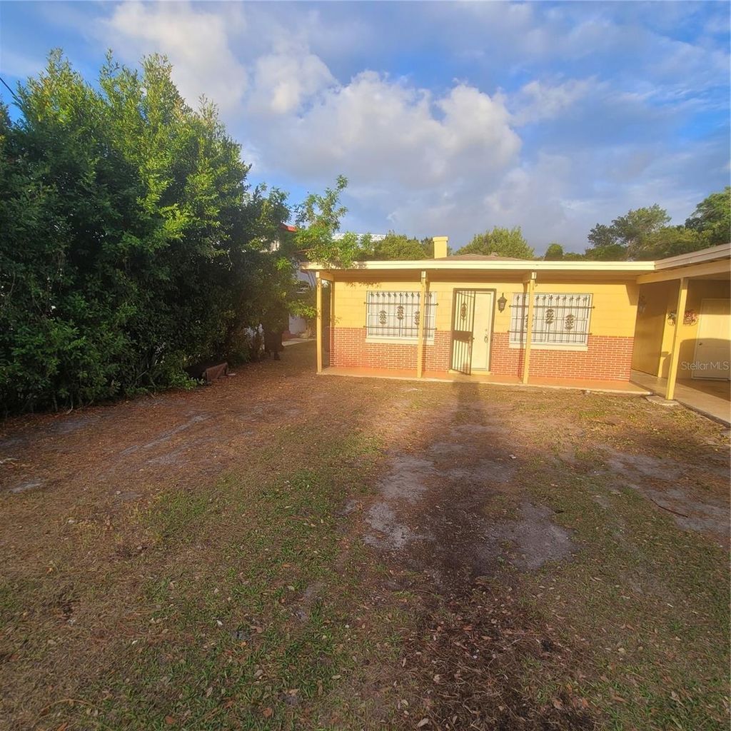 Photo of 409 S Lakeland Avenue, Orlando, FL 32805 (MLS # S5147009)