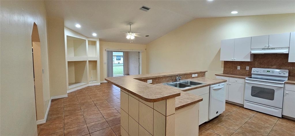 Photo of 3619 SW Santa Barbara Place #3619, Cape Coral, FL 33914 (MLS # C7520157)