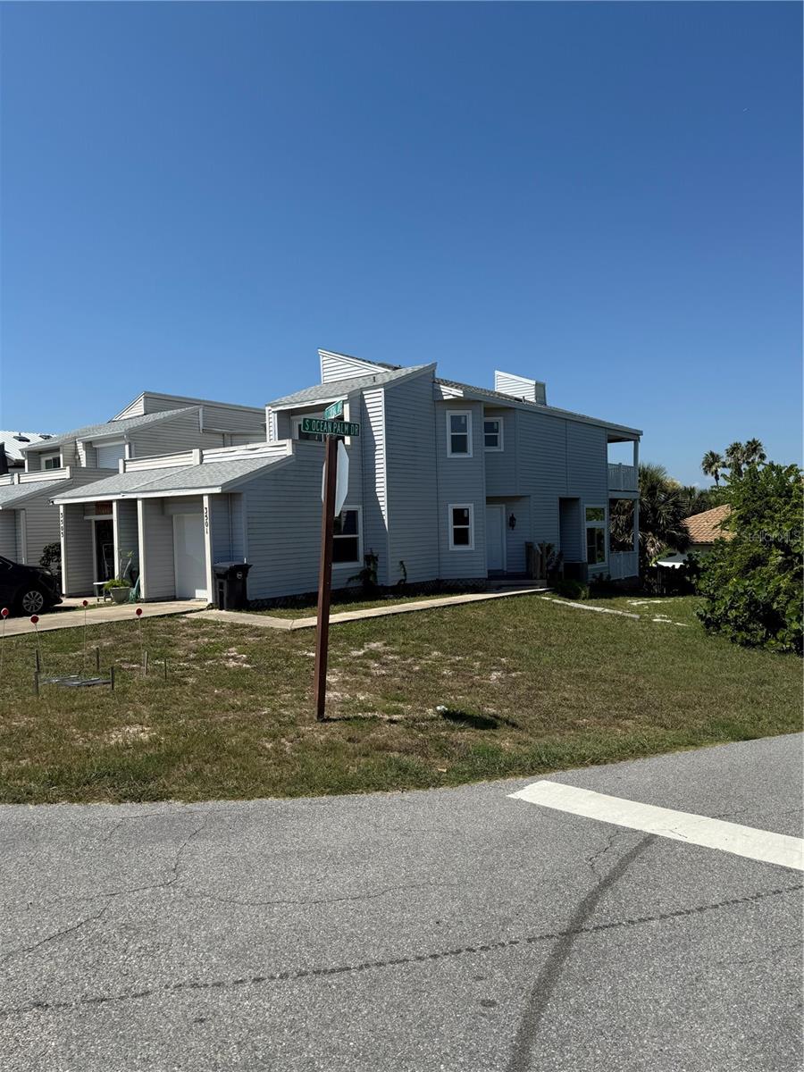 THIS PROPERTY HAS A SHORT TERM LICENSE !!!!!!!!Welcome to Flagler Beach Florida! , With Views of the GOLF COURSE, AND THE OCEAN, Great location, with no HOA, Introducing this beautiful townhouse with 2 bedroom 2,5 bath home with 1 car garage. offers a blend of modern amenities and stylish design. From the second floor balcony, you can enjoy ocean views. and in the rear of the house direct access to nine-hole golf course and view of the intracoastal. Master bathroom complete with a separate sink area enhancing convenience and privacy. The other additional bedroom are well-sized, ideal for family members or guests. with 2 Skylights throughout the property brings natural light. flooring have been recently upgraded to Laminate, the home has a fireplace for those cooler evenings. Additional features include hurricane impact windows for a safety 2024, Roof 2024 and newly Water Heater YOU WILL LOVE EVERYTHING ABOUT THIS HOME!!! YOU MUST SEE IT!!! Don't miss the opportunity to live in Flagler Beach (WALKING DISTANCE TO THE BEACH). Not far from restaurants, shopping, schools, and medical facilities! Quick access to I95 or US1 to travel North to St Augustine or South to Volusia County. READY TO MOVE RIGHT IN !!! WALKING DIST