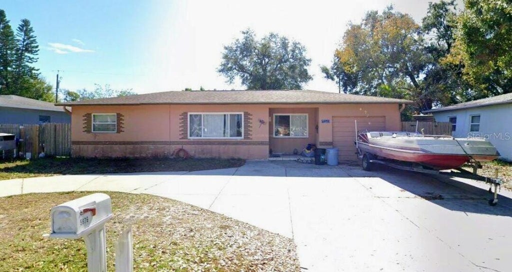 Photo of 5876 46th Avenue N, Kenneth City, FL 33709 (MLS # O6453648)