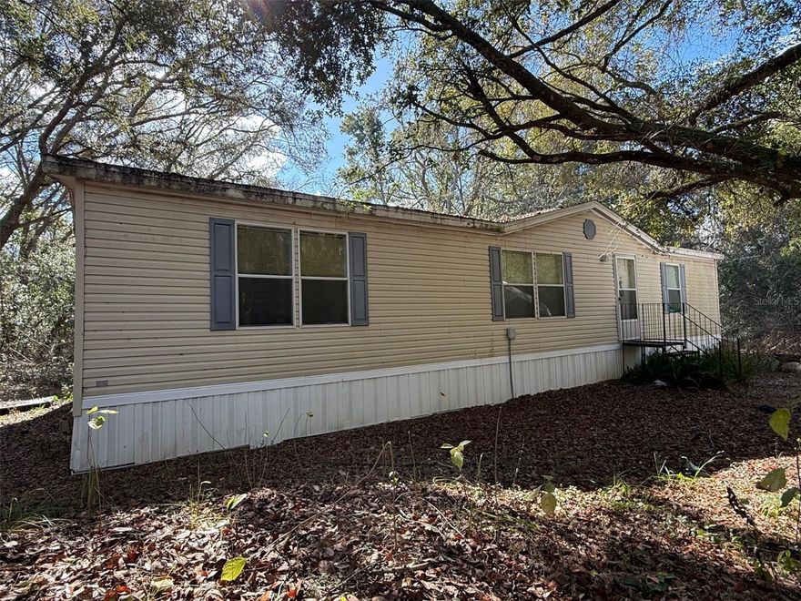 This rare 5-acre property, located in desirable Spring Hill, Florida, offers endless possibilities and the perfect blend of space, privacy, and opportunity. Fully fenced and surrounded by peaceful country vibes, this property is ideal for investors, builders, or anyone looking to create a dream lifestyle with room to grow. The value is in the land and this property is eligible for the USDA loan program.
The land currently features a 3-bedroom, 2-bathroom manufactured home with a large eat-in kitchen. Renovate and restore the existing structure, or remove it entirely and build a custom home from the ground up. With acreage of this size becoming increasingly rare in a rapidly growing area, the potential here is truly limitless.
Zoned for both agricultural and residential use, this property welcomes animals and is well-suited for a homestead, private retreat, or future development. Enjoy the quiet, open feel of country living while remaining conveniently close to local shops, dining, schools, and major highways. Just minutes from the Suncoast Parkway, commuting and access to surrounding areas are a breeze.
Opportunities like this don't come around often. Secure one of the few remaining full 5-acre parcels in Spring Hill and make it your own, whether you're looking to invest, build, or simply breathe a little deeper in a peaceful rural setting.