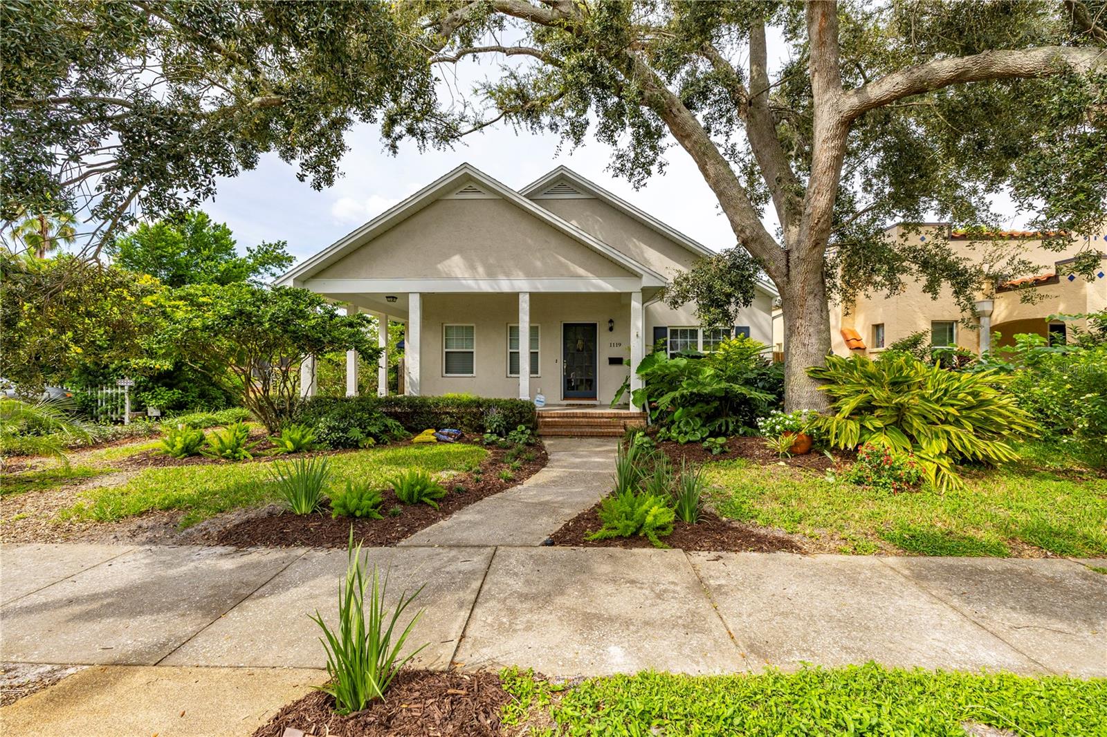 Welcome to 1119 25th Ave N located a NO FLOOD ZONE and in the highly coveted Historic Woodlawn neighborhood. Just minutes from bustling downtown St Petersburg! The picturesque Woodlawn neighborhood is known for its tree-lined streets, inviting sidewalks, neighborhood parks, historic homes built around community parks. 1119 25th Ave was custom built in 1997 by Frontier Homes with modern amenities, but architectural character that blends in with the lovely historic homes of this neighborhood.