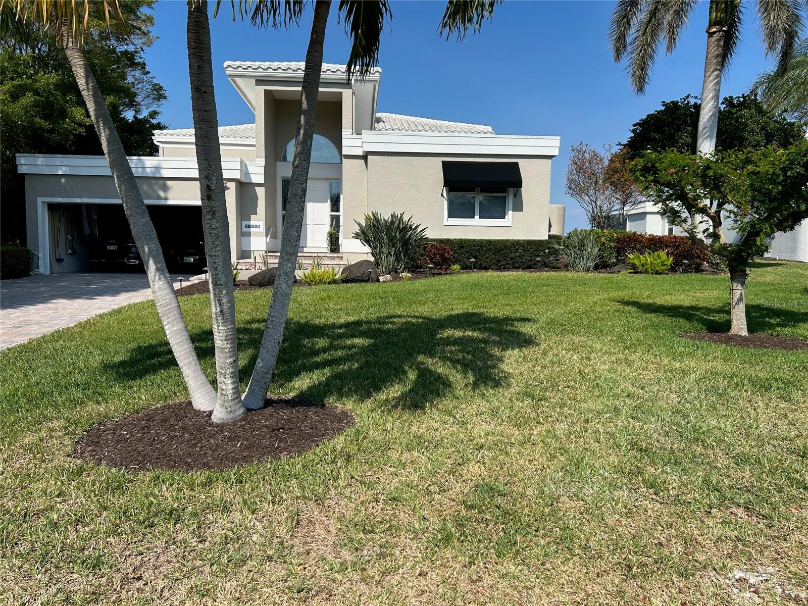 Direct bayfront Corey's Landing home situated on a double lot, on one of the most desirable streets in the community.