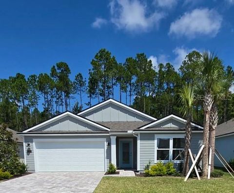Photo of 153 Greenwood Drive, Palm Coast, FL 32137 (MLS # FC312922)