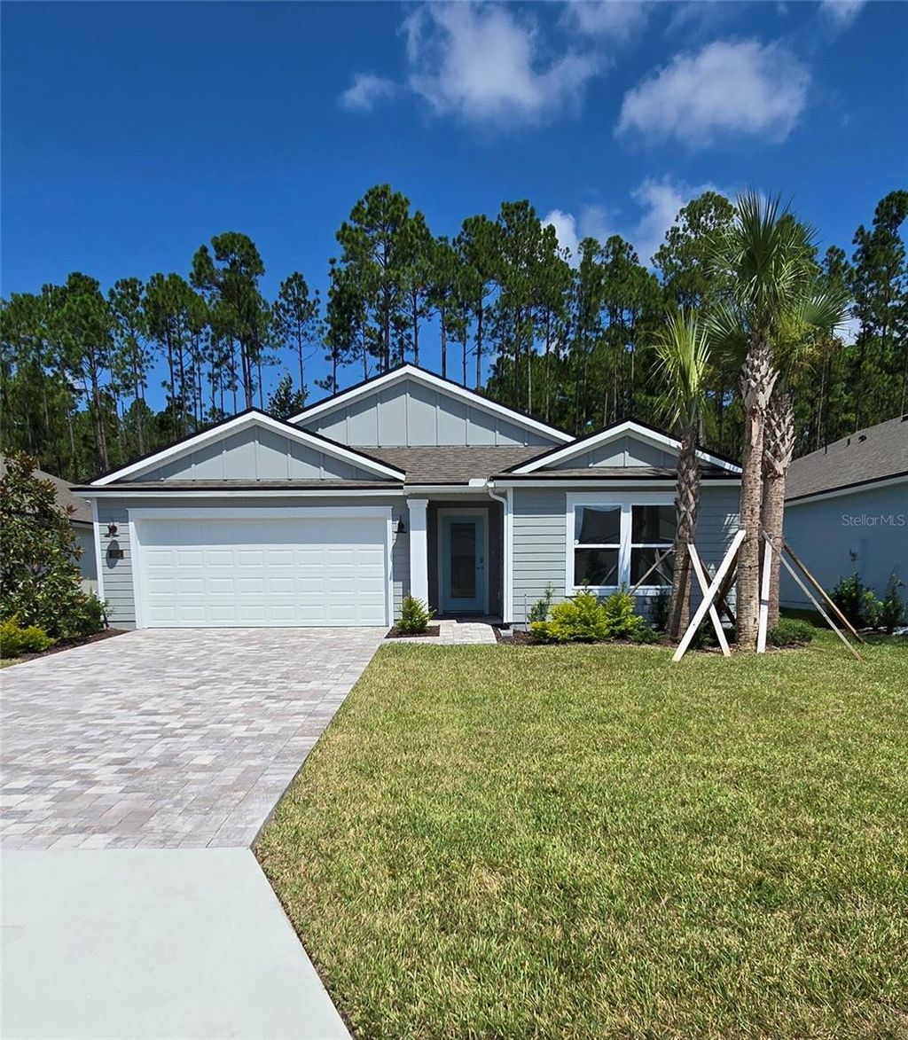 Photo of 153 Greenwood Drive, Palm Coast, FL 32137 (MLS # FC312922)
