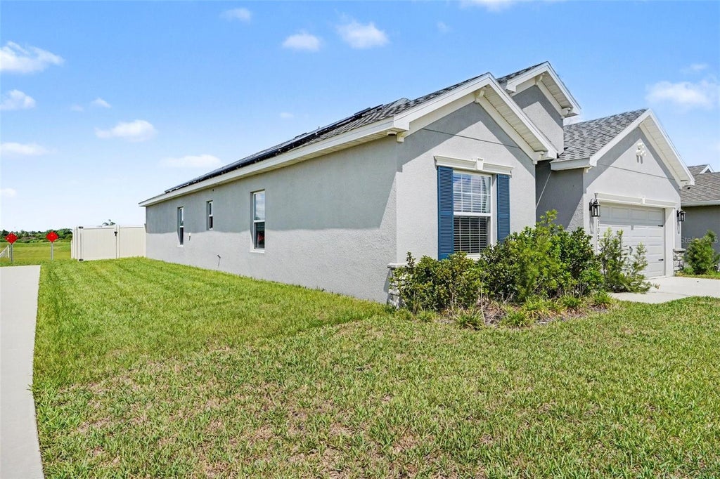 Photo of 6103 Hammock Island Way, Haines City, FL 33844 (MLS # TB8513930)