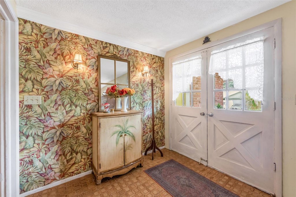 Photo of 1202 Royal Oak Drive, Dunedin, FL 34698 (MLS # TB8553560)