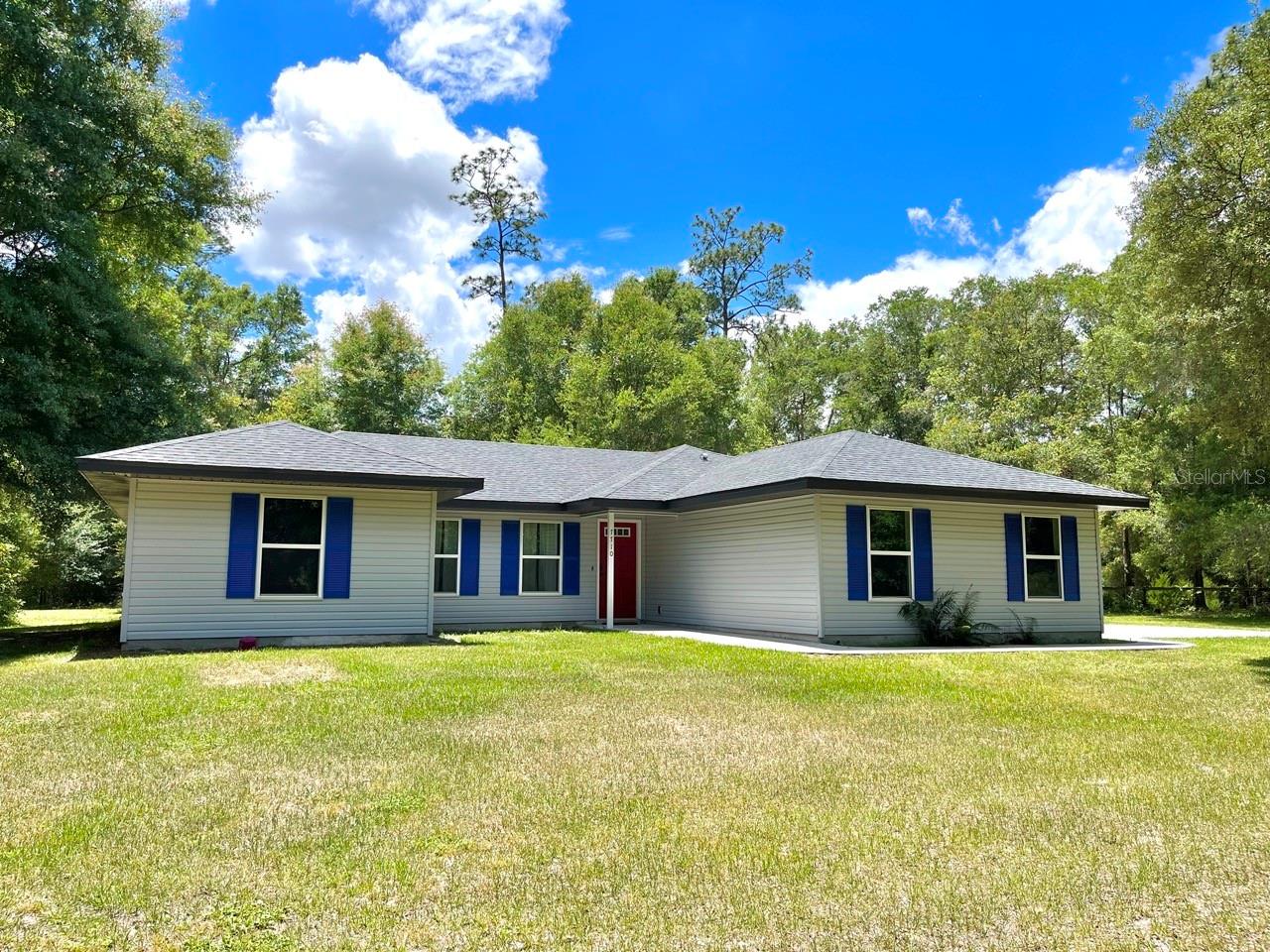 Beautiful turnkey 3 bedroom 3 full bath home located less than a mile from the World Equestrian Center. Enjoy the peaceful 3 acre property that is dotted with lovely trees that provides exceptional privacy. The home is offered fully furnished with a spacious primary bedroom and walk in closet, two guest bedrooms with their own separate bathroom. Step outside the sliding glass doors and relax on the concrete patio. The home is only 4.5 miles to Publix, 9 miles to Downtown Ocala, and 8 miles to shopping.