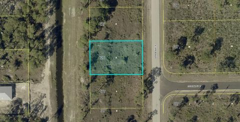 Photo of 806 Genoa Avenue S, Lehigh Acres, FL 33974 (MLS # A4691114)