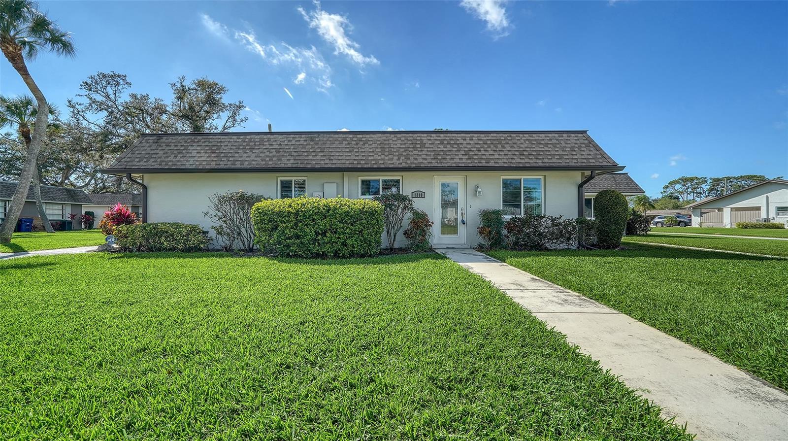 Updated Villa Move in Condition - 2 bedroom 2 bath plus Den - Property features New Roof in 2017 - New gutters 2018 - New Hurricane proof Windows 2019 - New AC 2021 - Updated Master bathroom -New Front and back aluminium hurricane rated doors 2021 - Porch pavers 2021 - Sewer pipes relined - The layout provides ample living space with open floor plan - Forest Pines is a 55+ community with heated swimming pool - Shuffleboard courts - Clubhouse with fitness center - Furnishings included
