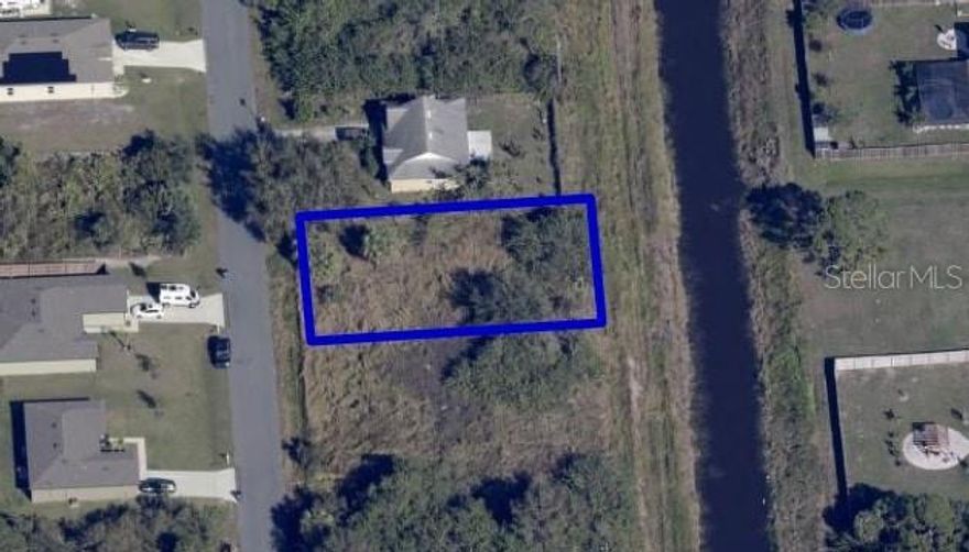 Build your dream home on this prime residential lot in a growing and sought-after community! This cleared parcel offers convenient access to major roads and shopping. Zoned for single-family use with public utilities nearby (buyer to verify), this is an excellent opportunity for a custom home or future investment—no HOA and no time frame to build. Don’t miss this rare opportunity to own land in a high-demand area—drive by today and envision the possibilities!
Backed up to a small canal means no neighbors directly behind you.